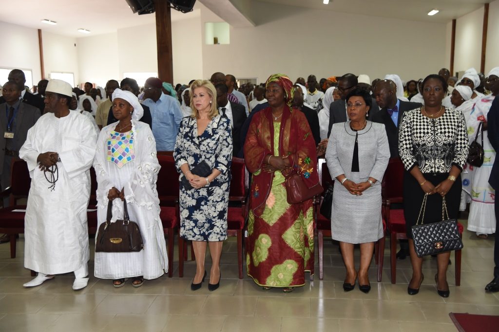 The First Lady Dominique Ouattara alongside the bereaved family