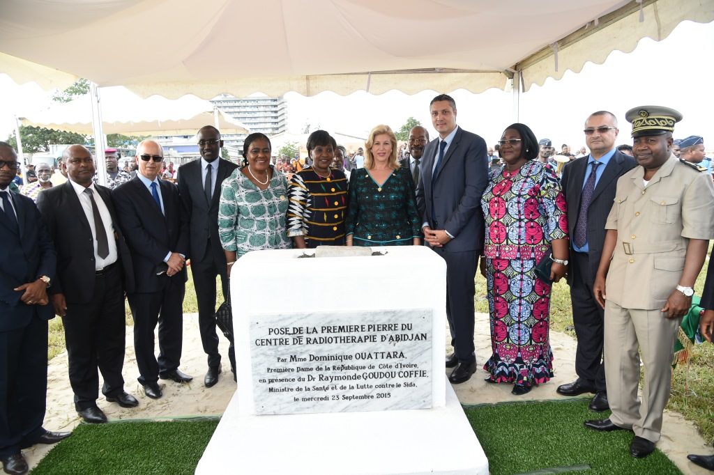 First Lady Dominique Ouattara lays the first stone of a radiotherapy center